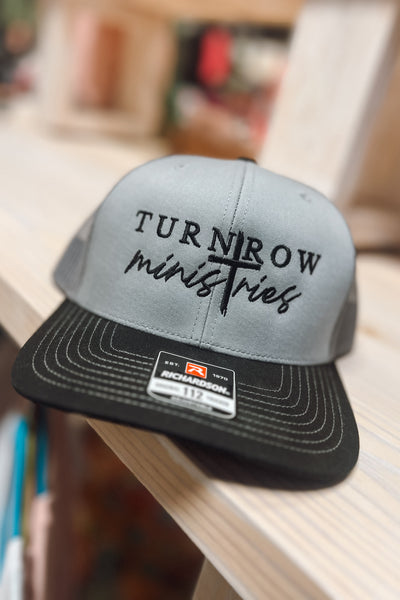 Turnrow Ministries Trucker Hat (Assorted Colors)