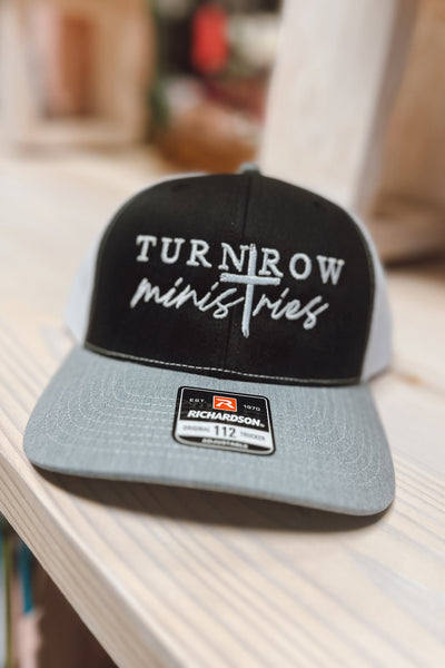 Turnrow Ministries Trucker Hat (Assorted Colors)