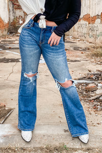 Risen Mid-Rise Distressed Flare Jeans