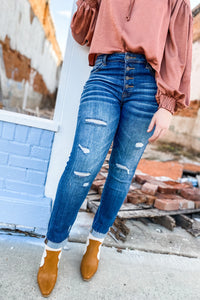 Risen Mid-Rise Distressed Button Fly Skinnies